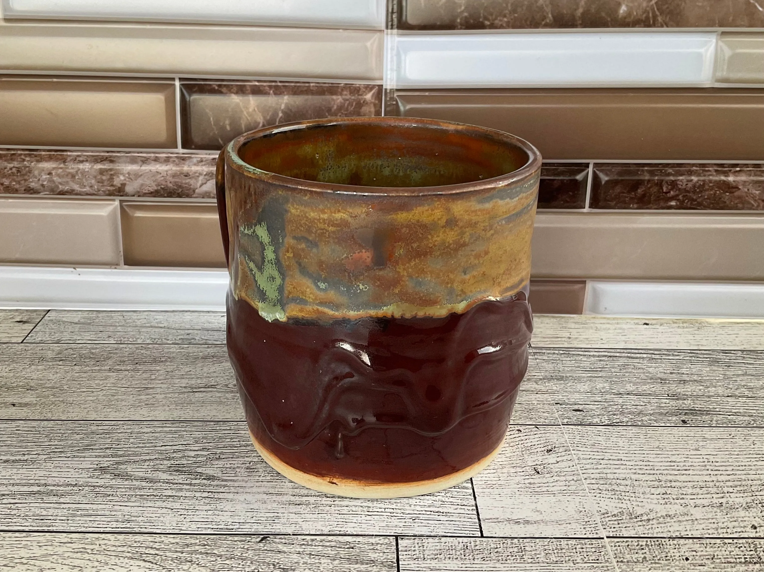 15 oz Green Tea over Cordovan Drippy Ceramic Mug