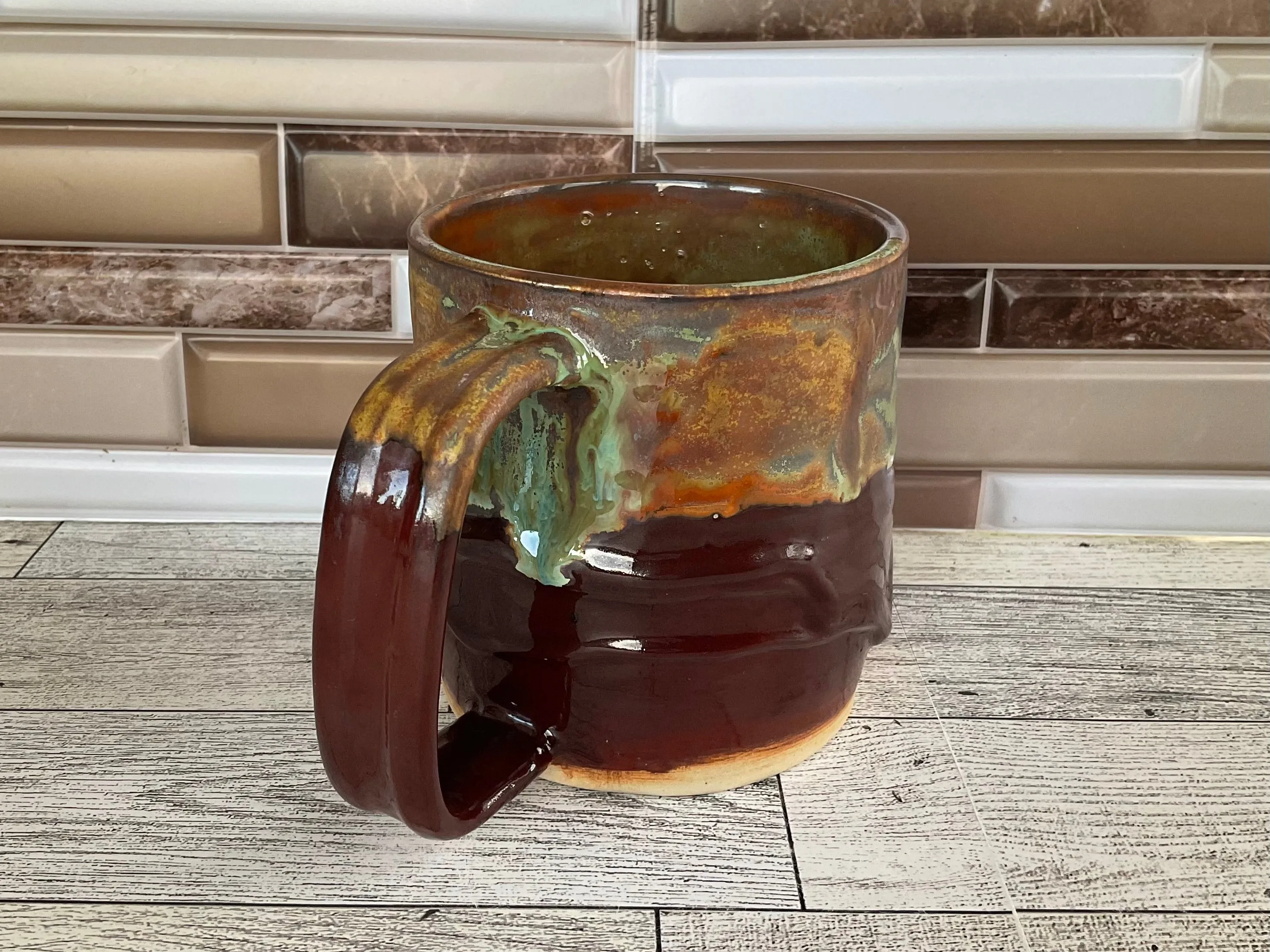 15 oz Green Tea over Cordovan Drippy Ceramic Mug