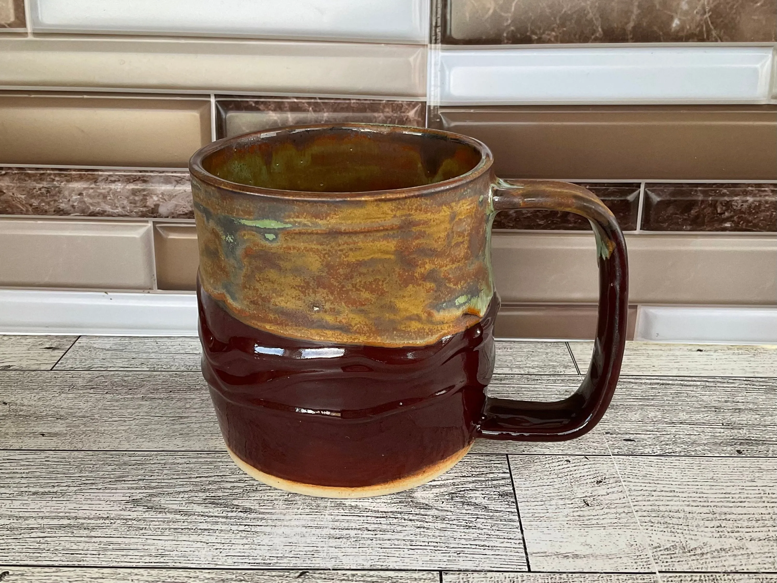15 oz Green Tea over Cordovan Drippy Ceramic Mug